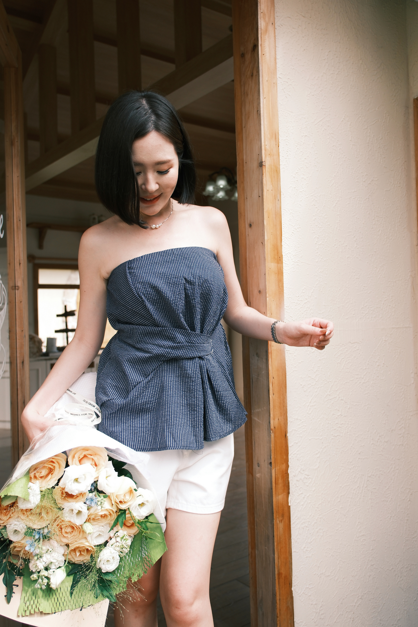 Éloise Strapless Pinstripe Peplum Top in Blue