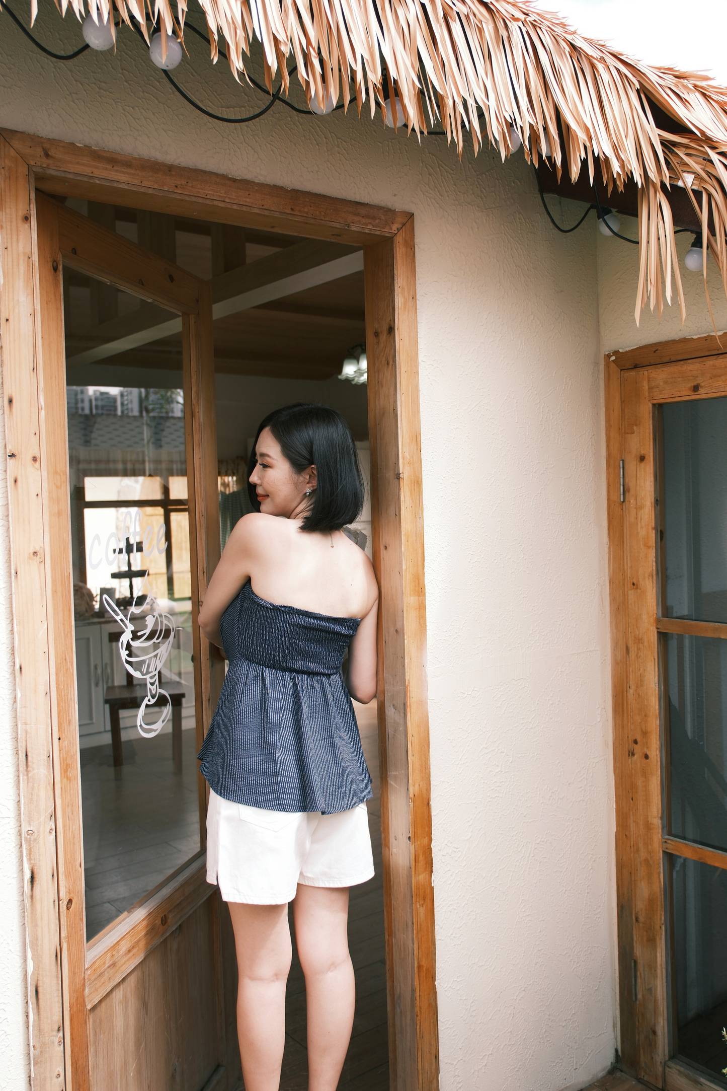 Éloise Strapless Pinstripe Peplum Top in Blue