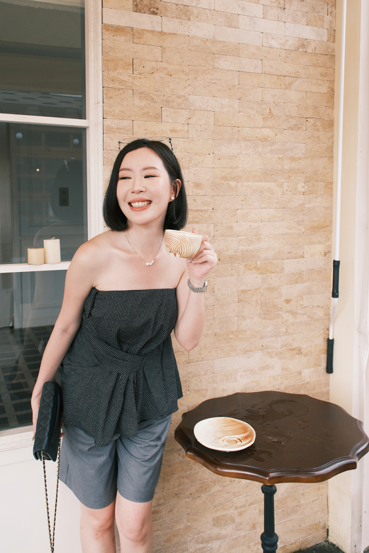 Éloise Strapless Pinstripe Peplum Top in Black