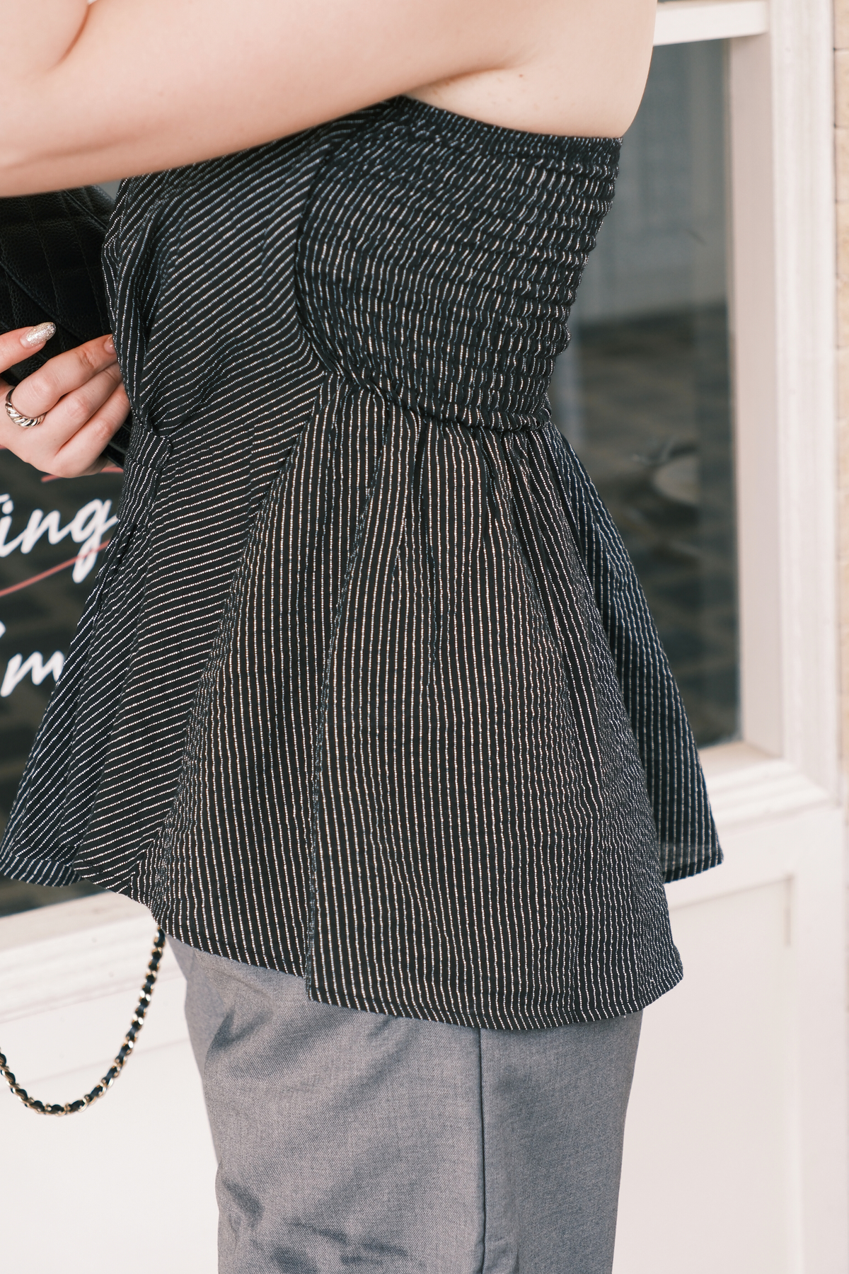 Éloise Strapless Pinstripe Peplum Top in Black
