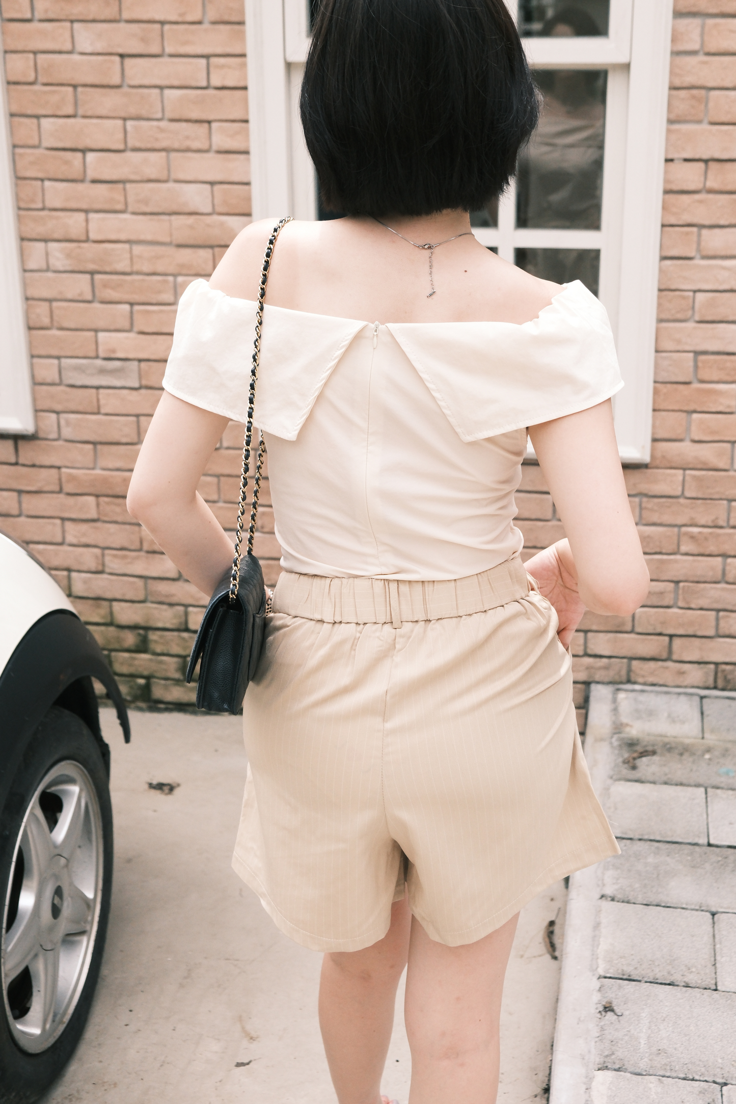 Amelie Pinstripe Tie-Waist Shorts in Beige