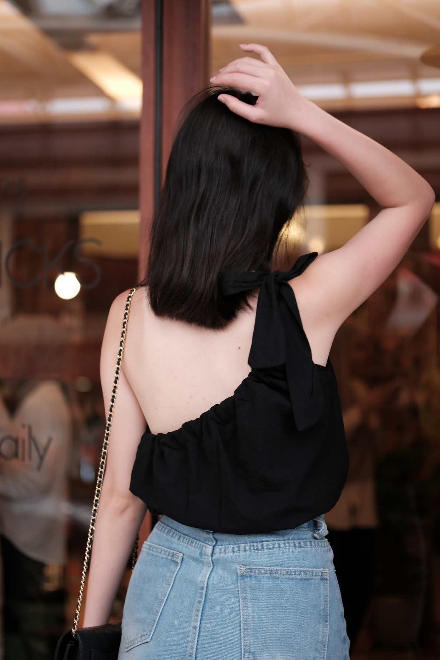 Sasha One-Shoulder Bow Crop Top in Black