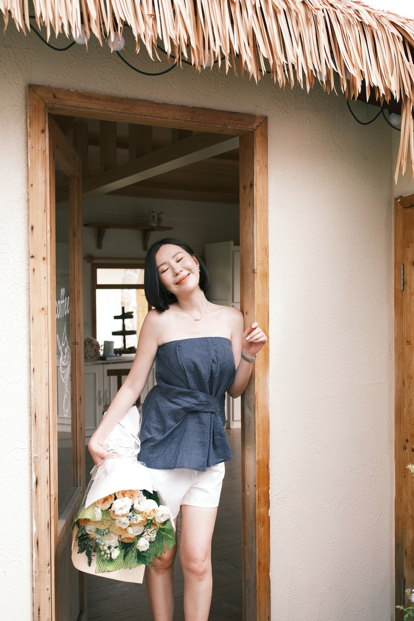 Éloise Strapless Pinstripe Peplum Top in Blue
