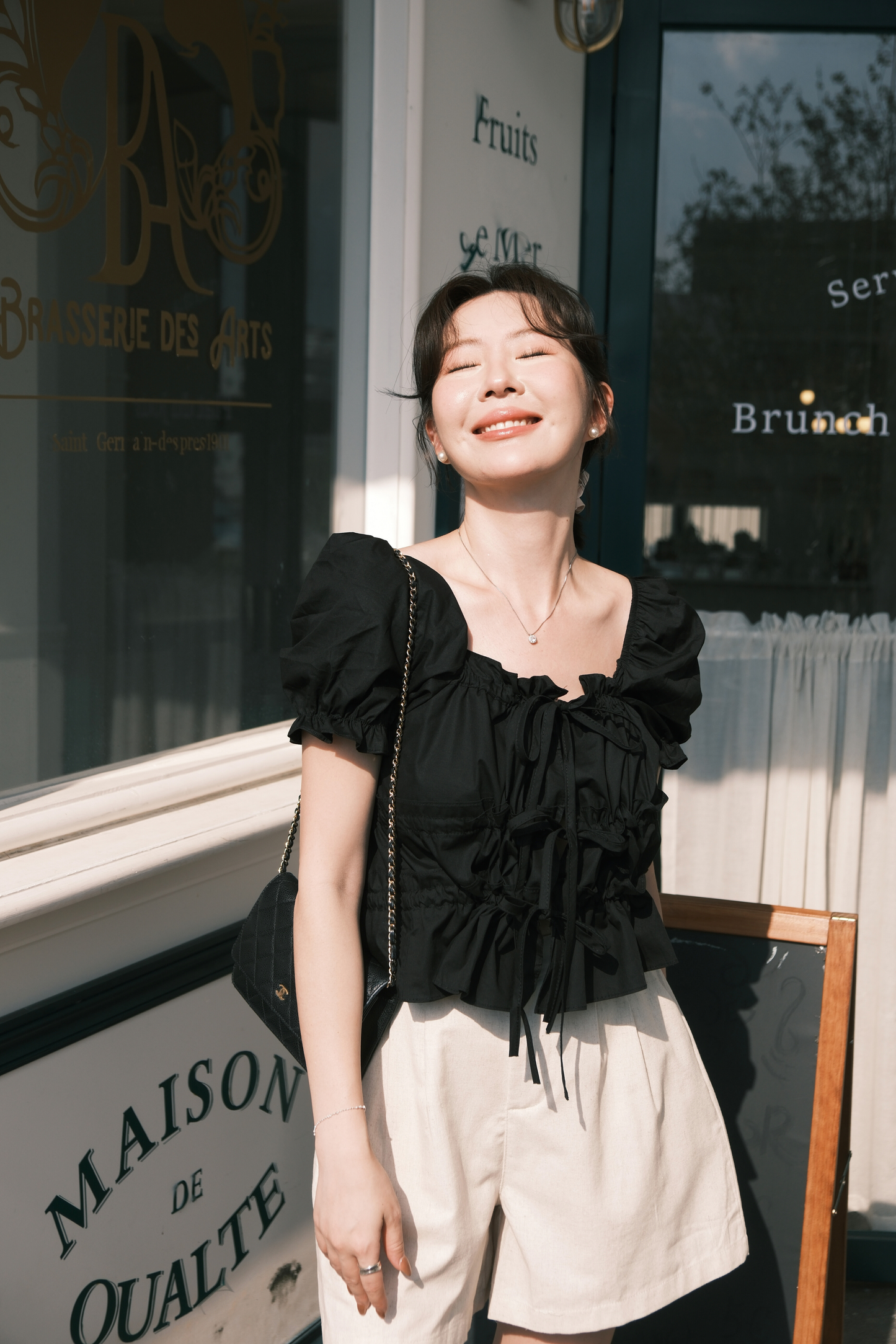 Noelle Ruched Tie Blouse in Black