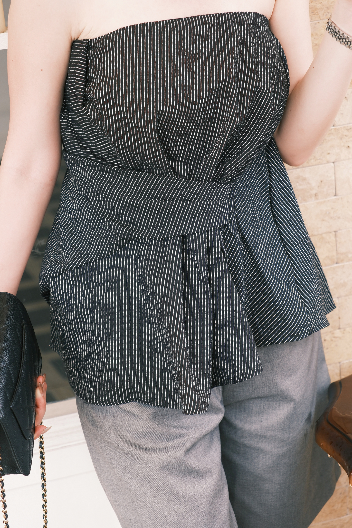 Éloise Strapless Pinstripe Peplum Top in Black
