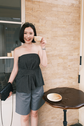 Éloise Strapless Pinstripe Peplum Top in Black