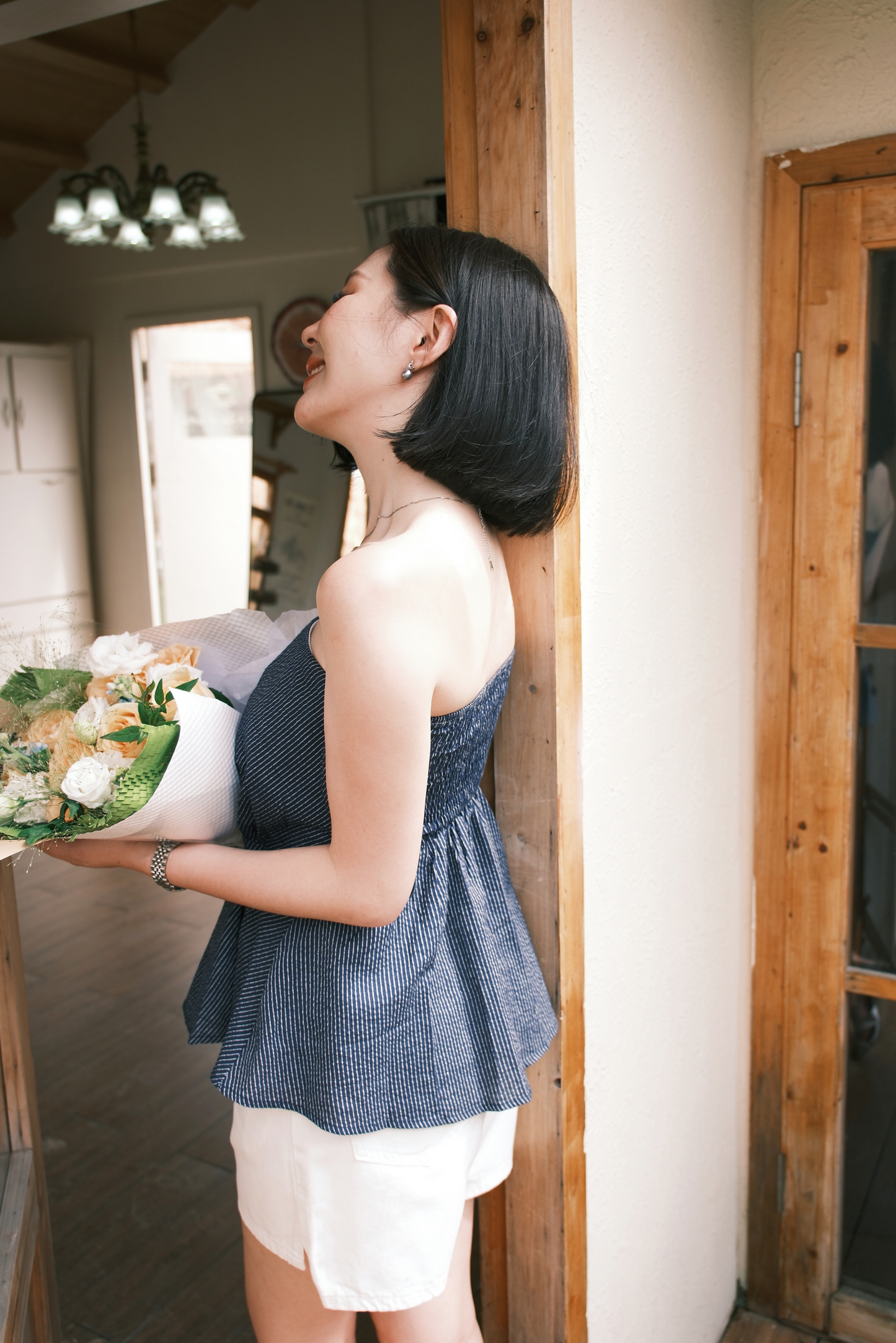 Éloise Strapless Pinstripe Peplum Top in Blue