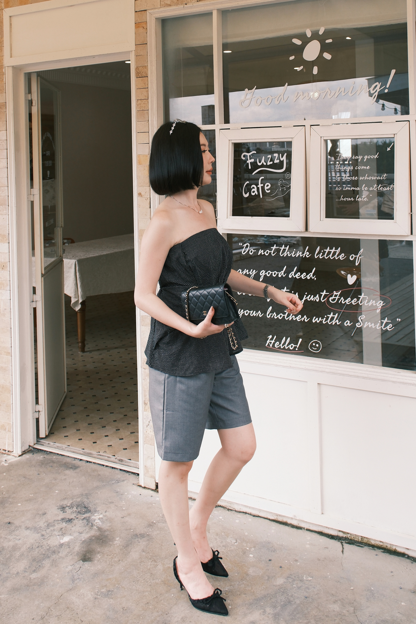 Éloise Strapless Pinstripe Peplum Top in Black