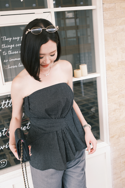 Éloise Strapless Pinstripe Peplum Top in Black